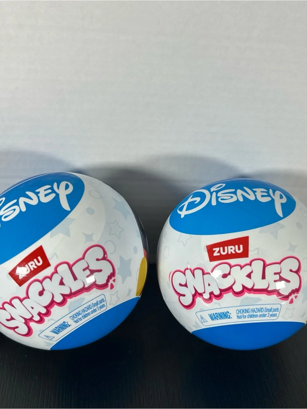 Snackles Disney Surprise Ball with collectible plush set of two brand new